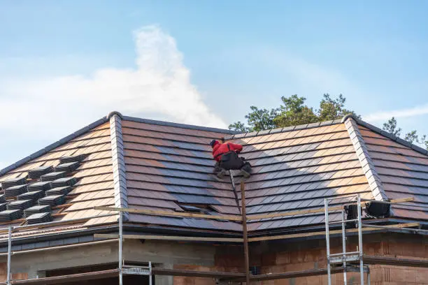 Insurance Claim 1 Worker on a tile roof