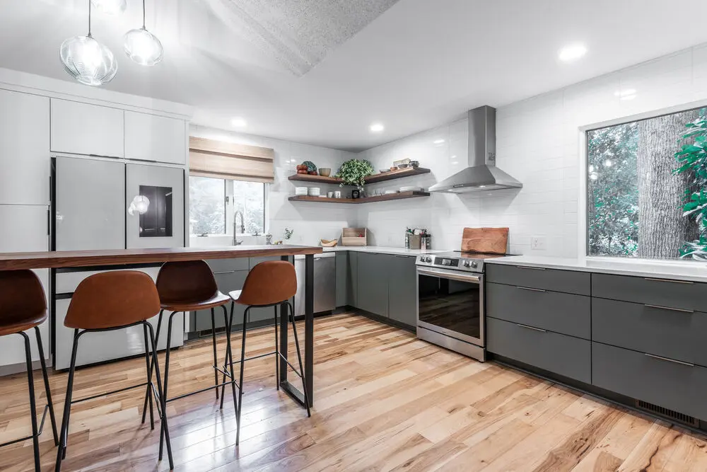 Home 7 Open kitchen remodel with gray cabinets and wood floors